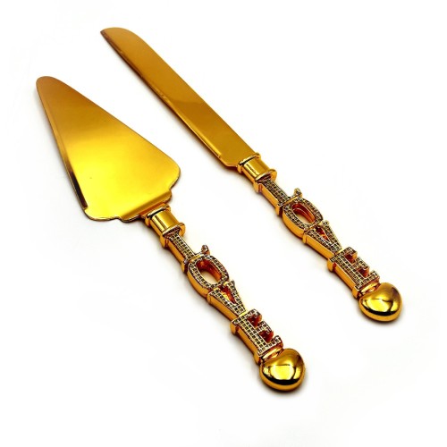 Cake Knife and spatula gold colored metal and LOVE type face handles